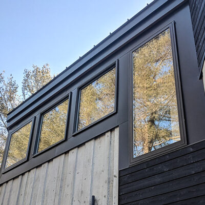 Fascia and Window Trim in Matte Black on a Muskoka cottage.