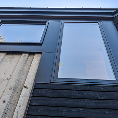 Fascia and Window Trim in Matte Black on a Muskoka cottage.