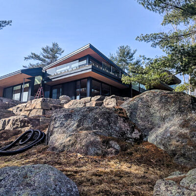 1.5" Standing Seam in Musket Grey with Crinkle Finish on a cottage in Muskoka.