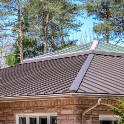 Standing seam roofing in brown on a residence, one of Alrpo Metal Roofing projects.