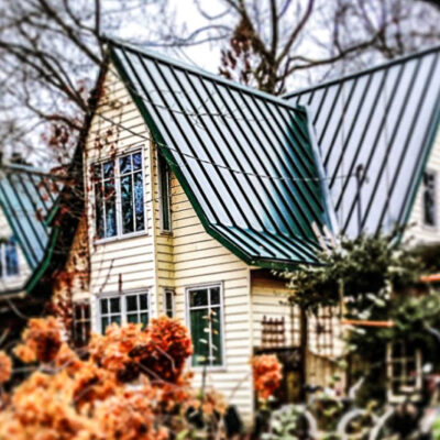 1.5" Standing Seam in Forest Green on a victorian home on Toronto Island.