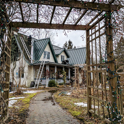 1.5" Standing Seam in Forest Green on a victorian home on Toronto Island.