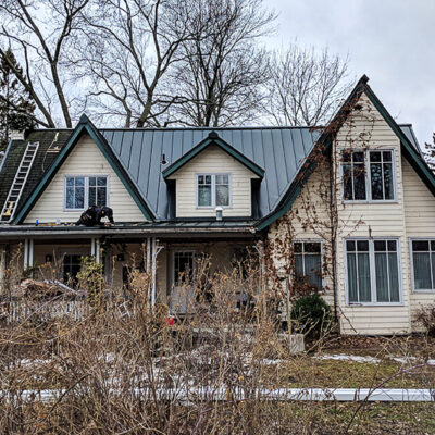 1.5" Standing Seam in Forest Green on a victorian home on Toronto Island.