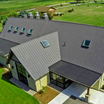 Standing seam metal roof with custom metal chimney's for a crematorium.